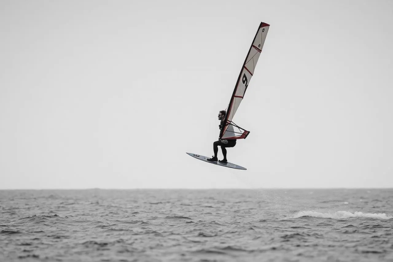 Rider learning to foil on open water